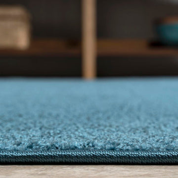 Haze Solid Low-pile Area Rug Turquoise